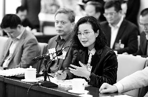 民盟中央提案:貧困地區(qū)試點15年免費教育